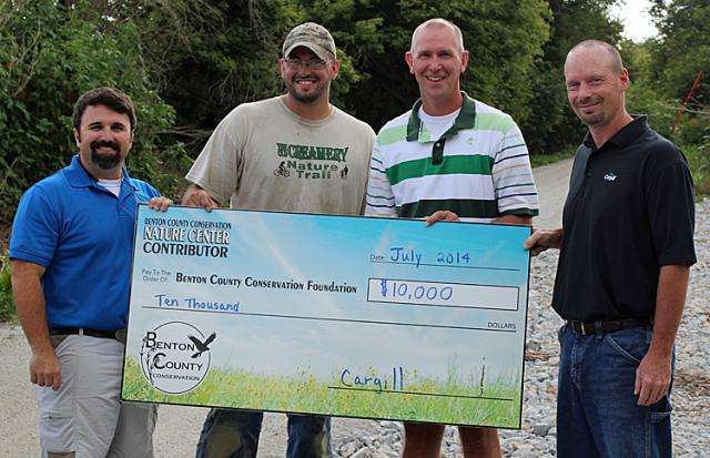 Cargill rep Tom Stueck presented another check to the BCCB for the Old Creamery Nature Trail.