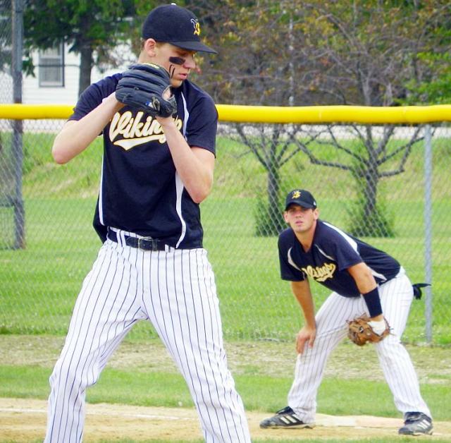 Starting pitcher Carson Struve checks the runner against DeWitt Central in Game 1.