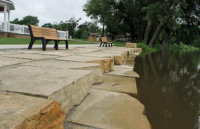 At 17.17 feet, the Cedar River water begins to cover the first step down from Celebration Park.
