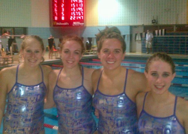 Savannah Jensen, Katie King, Emily Freeland & Lauren Krupa set school record in 200 Freestyle Relay.