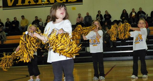 Dozens of young cheerleaders performed before VS varsity game.