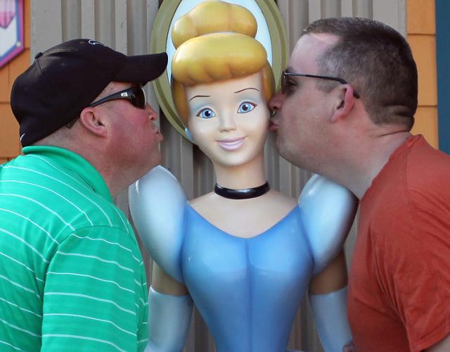 Band chaperones Chris Bendull and Jason Hicok with Cinderella.