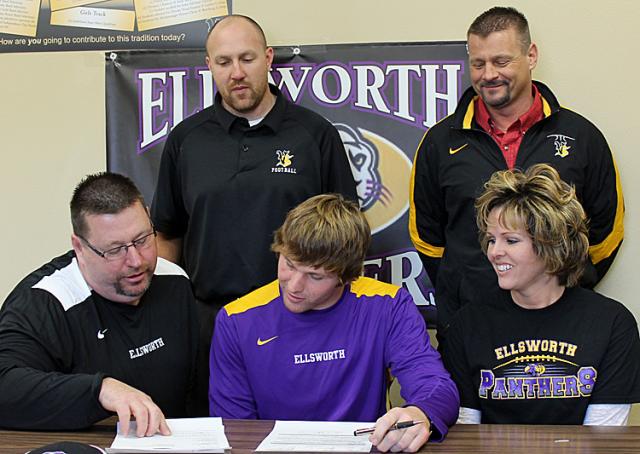 Viking Chris Merchant signed a Letter of Intent to play football for Ellsworth Community College.