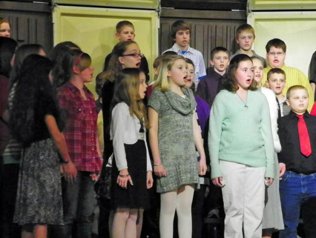 The 6th grade chorus performs during the Holiday Concert.