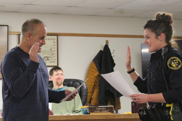Mayor Bud Maynard swears in Officer Laura Deaton as the newest member of the Vinton PD