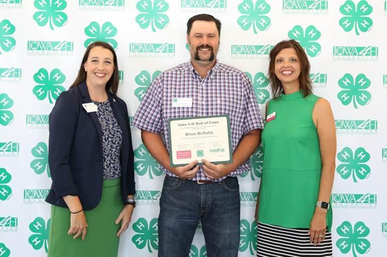 Brian McNulty pictured with Emily Saveraid (left), and Executive Director, Tillie Good