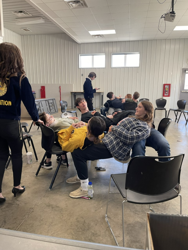 Ag 1 students practiced teamwork to flip over a 