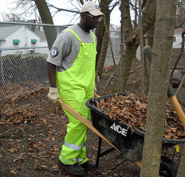 A Maple 7 member helps with landscaping in Youngstown, Ohio.