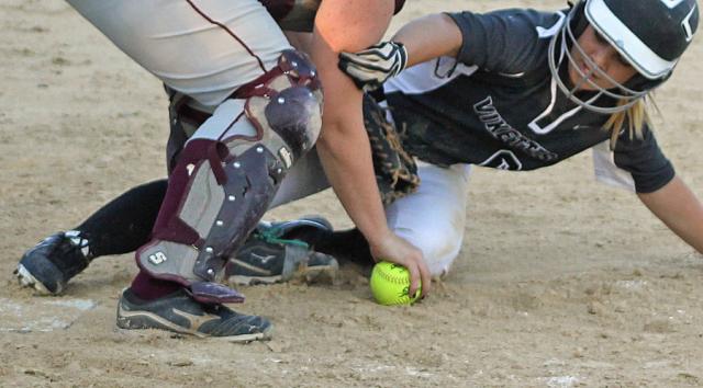 This close: Pinch-runner Hannah Kalous was called out at the plate; the Vikettes eventually lost, 5-