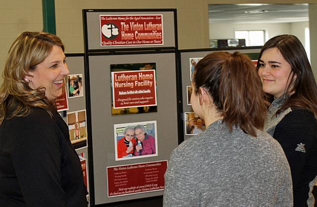 Lana Elwick answers employment questions about the Vinton Lutheran Home during the Job Fair.