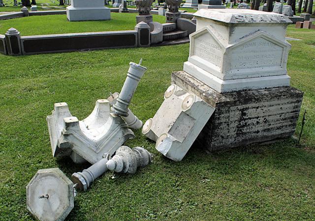 More than 20 tombstones, including this one honoring a Civil War veteran, were damaged overnight.