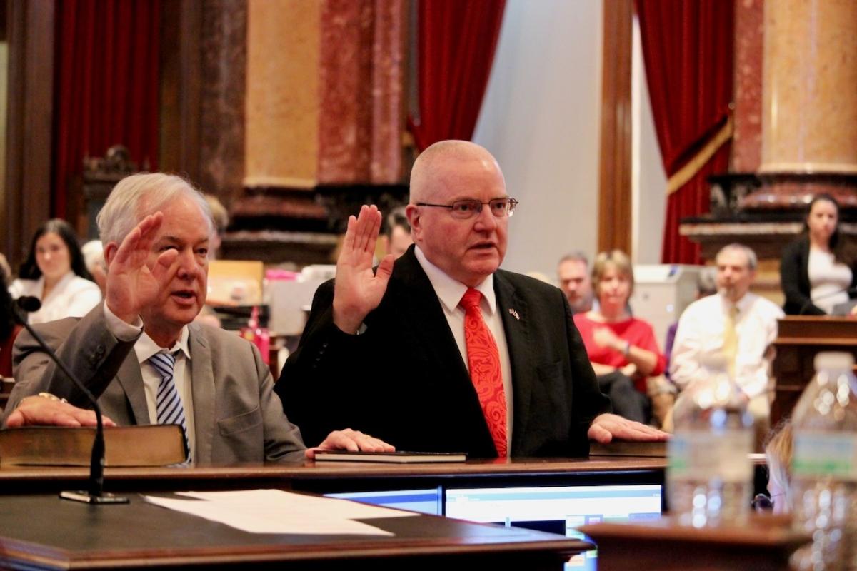 Senator Charlie McClintock being sworn in to the Iowa Senate District 42 seat