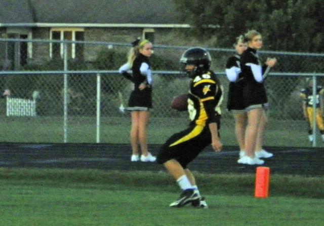 Josh Ferguson crosses the goal line after interception; sophomores come back to defeat Marion.