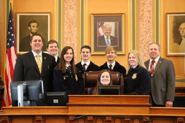 State Representative Tom Gerhold (Atkins) and students with the Benton and Belle Plaine FFA.