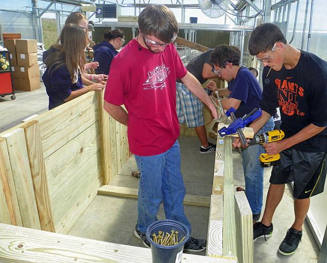 VSHA Aqua Science students are building the new aquariums in the greenhouse this week.