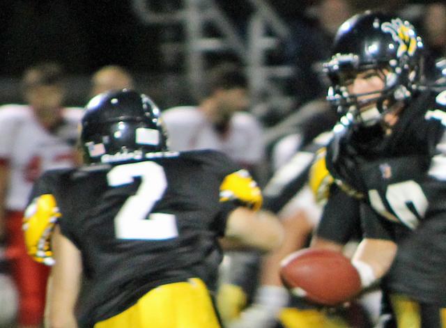 Chase Overton hands the ball to Nick Hyland.
