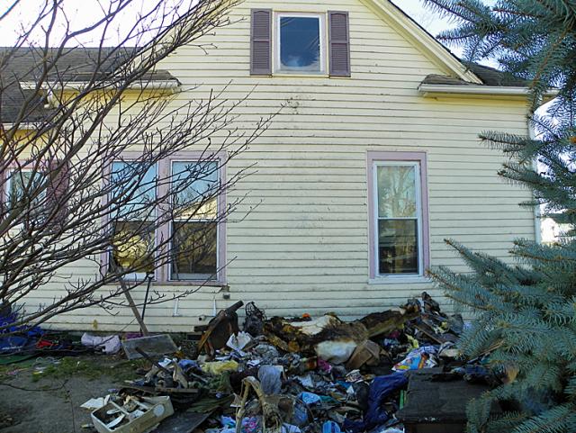 Officer Josh West and Tony Thompson of the NBA service saved a family from a fire at this house.