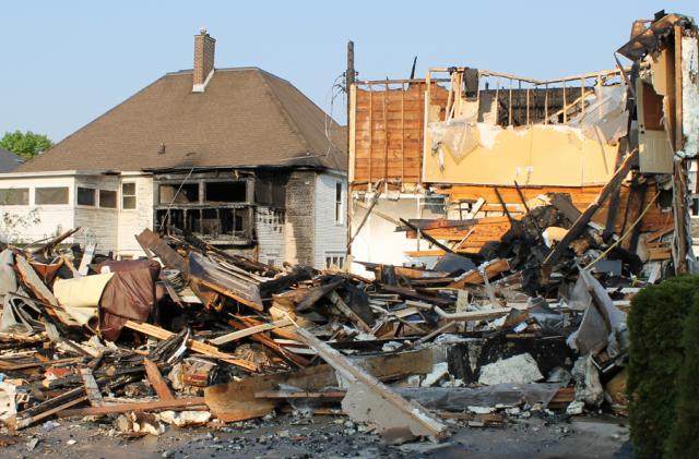 A fire that started in a garage also destroyed Joe Wehage's historic carriage house office.