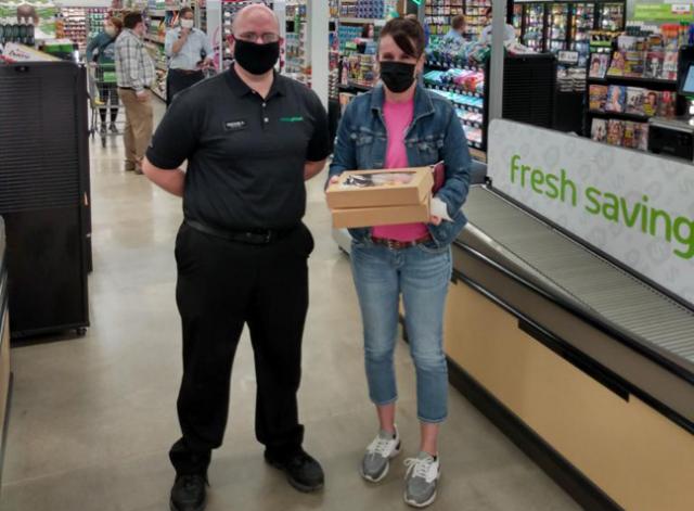 Michelle Ruess was the first customer at Vinton's Hy-Vee Dollar Fresh on Friday Morning