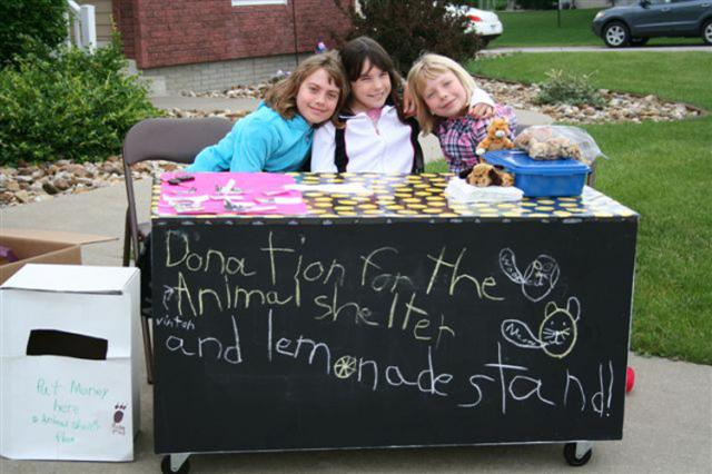 Ashton, Desiree, and Riley of Atkins helped to raise funds for the Animal Shelter
