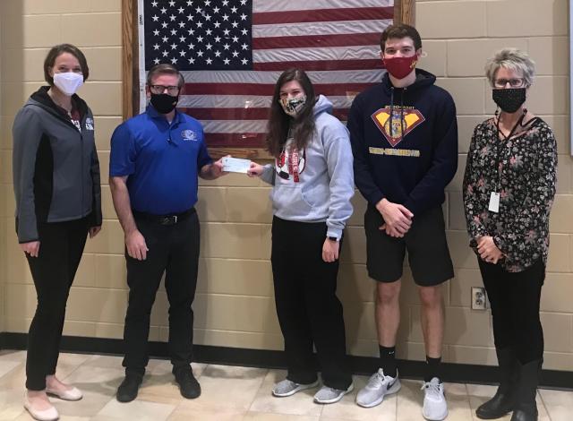 The Vinton Kiwanis Club makes $1,500 donation to The Backpack Program