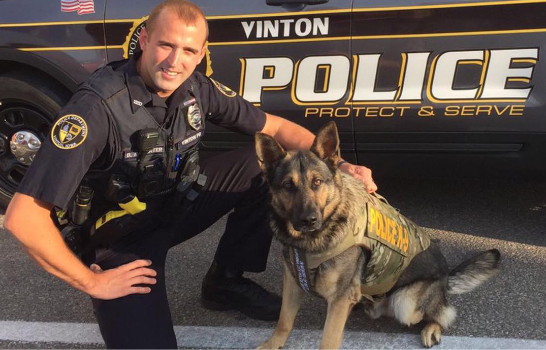 Vinton Police Department Captain Ben Parmater with his now retired partner, Gino. Photo circa 2020.. Click to read article