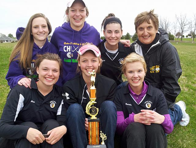 Vikette golfers and coach Janet Woodhouse celebrate WD Tournament win Monday.