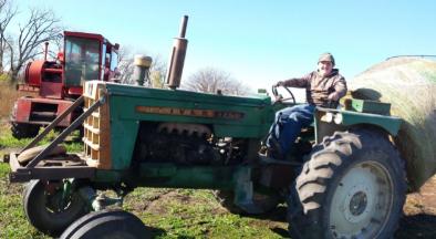 Grant Ries enjoys hauling hay in from the field,