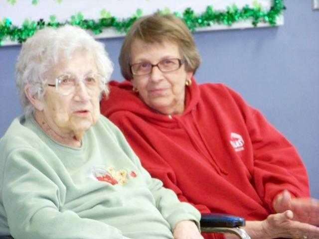 Trudy Pribbenow, age 100, sits with daughter Nancy Scott.