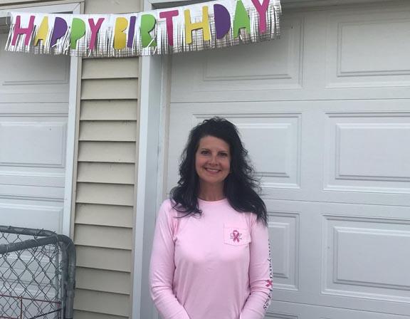 Cyndi Stueck with the gift she is giving away for her birthday