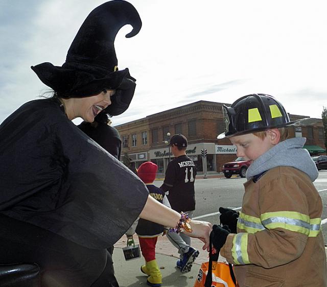 Halloween Parade: Tammy Fett wore a witch's hat while passing out candy at New Beginnings.
