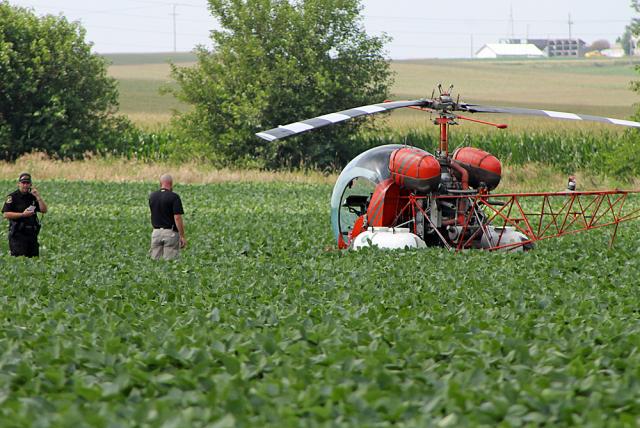 This helicopter landed in a field near Vinton on Tuesday; no damage or injuries were reported.