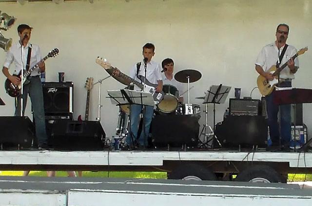 Now Straitrun, the Schmidt band performed in Hiawatha for Hog Wild Days in June.