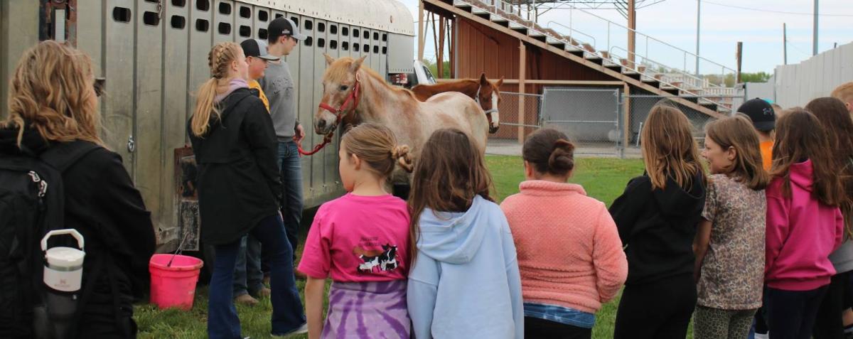 Vinton-Shellsburg FFA Members Alana Fleming, Caleb Blattler, and Jameson Demuth teach about horses.