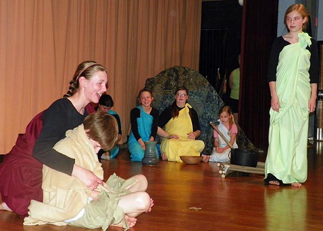Massua (Maree Bean) welcomes home her son Mowgli (Nathan Franck) in the HSAP 'Jungle Book.'