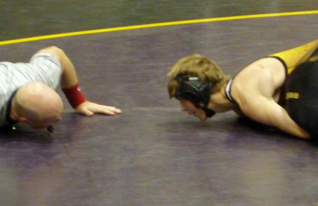 Ian Storey began his season with a pin against an East Marshall opponent Thursday evening.
