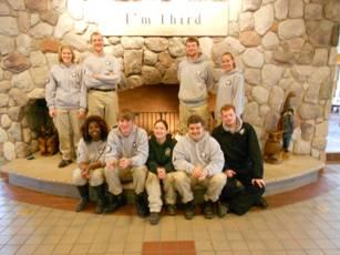 AmeriCorps NCCC Cedar 5 at the fireplace in Malachi Dining Hall at YMCA Storer Camps, Jackson, MI.