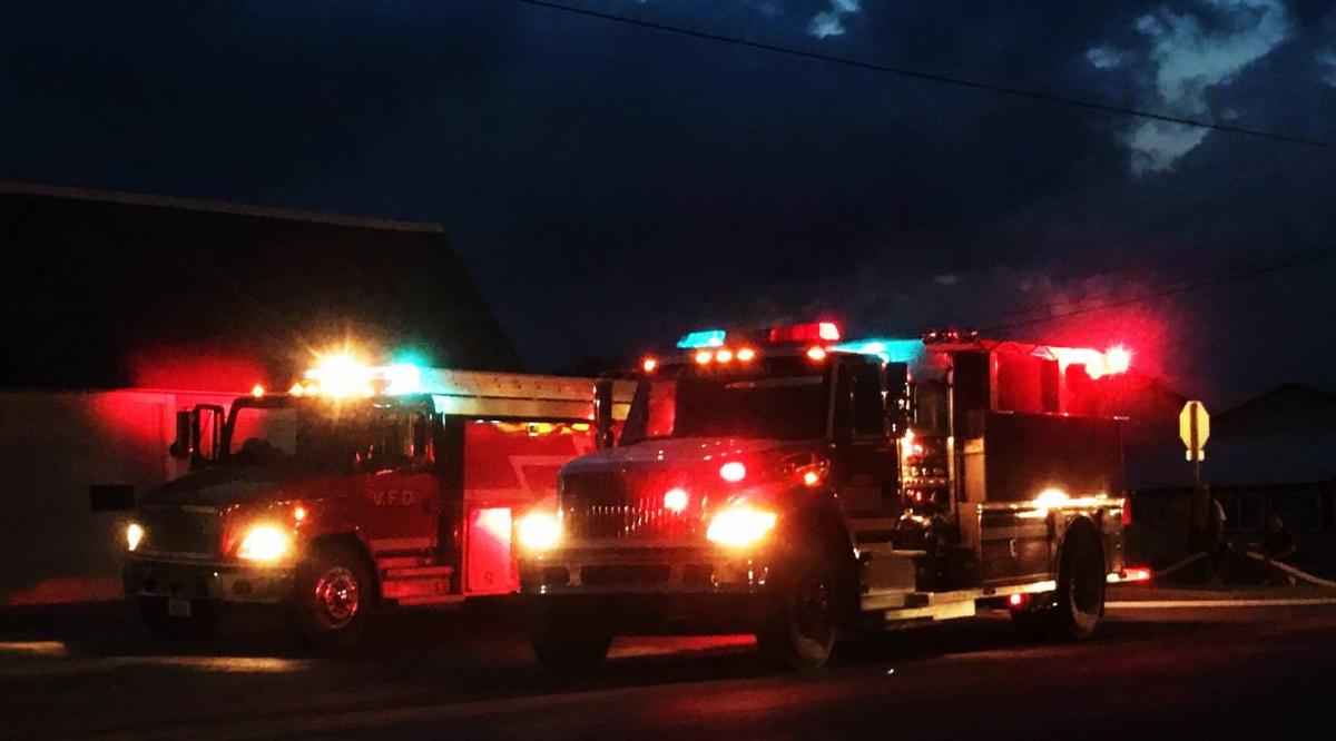 Trucks loading up with water in Newhall to return to the fire outside of town.