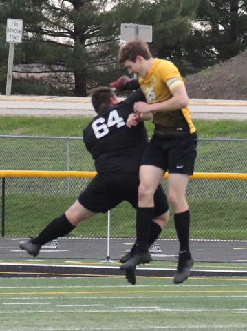 JJ Sloop (64) and Ethan Rollinger celebrate a Viking goal against Mt. Vernon