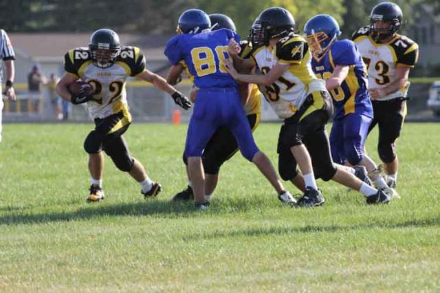 Ben Hyland heads upfield in the VS sophomore victory at Benton.