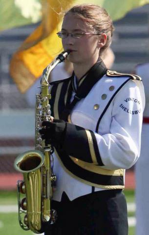 Claire Andreesen plays a sax solo at the State event.