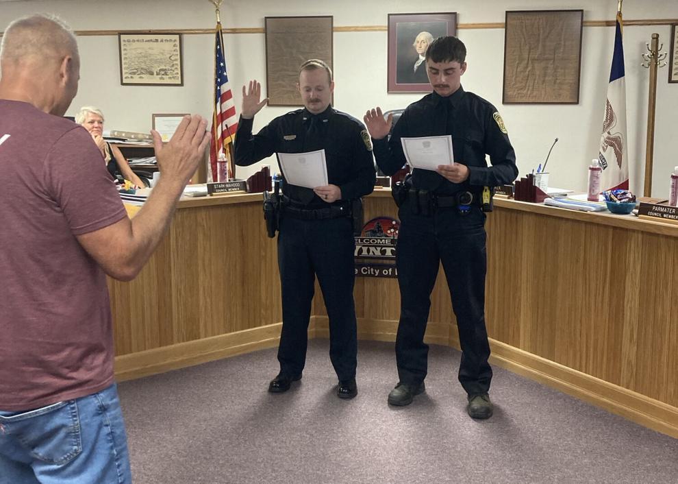 Officers Kody Pierson and Zachary Staab take their oath of office to join the Vinton Police Department