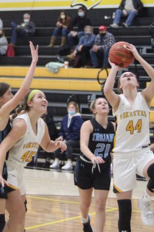 Brylee Bruce drives for two of her game-high 14 points Tuesday night