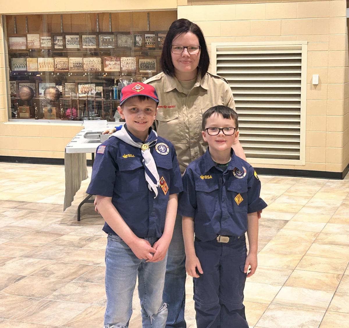 Local Boy Scouts lent a hand to assist with clearing the tables 