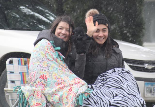 Lillie Lamont (left) and Carli Lang wave to the camera during their send off on April 13