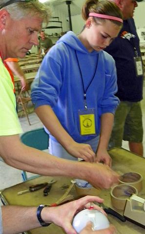 Jim and Rayna Breitbach build shells.