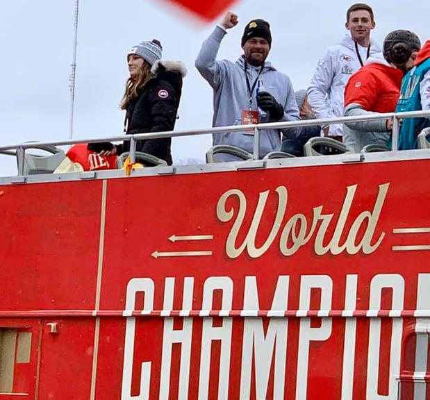 Jay White rides in the parade celebrating the Chiefs first Super Bowl win in 50 years