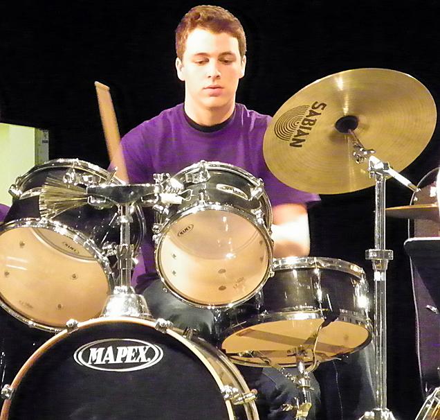 Will Hancock plays his drum solo during the Jazz Band pep rally.