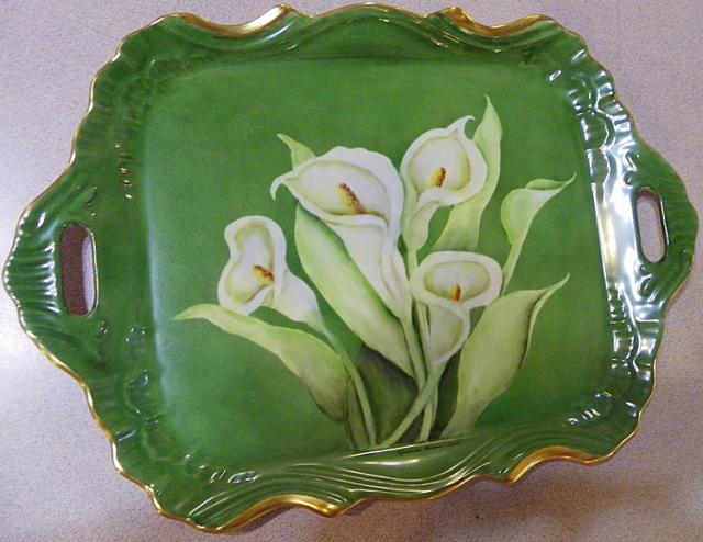 A serving tray painted by Jeanne Mann, available at Clingman Pharmacy.