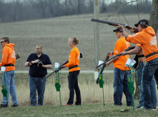 John Betterton takes aim as the rest of the Cedar Shooters 'Black Team' waits their turn.